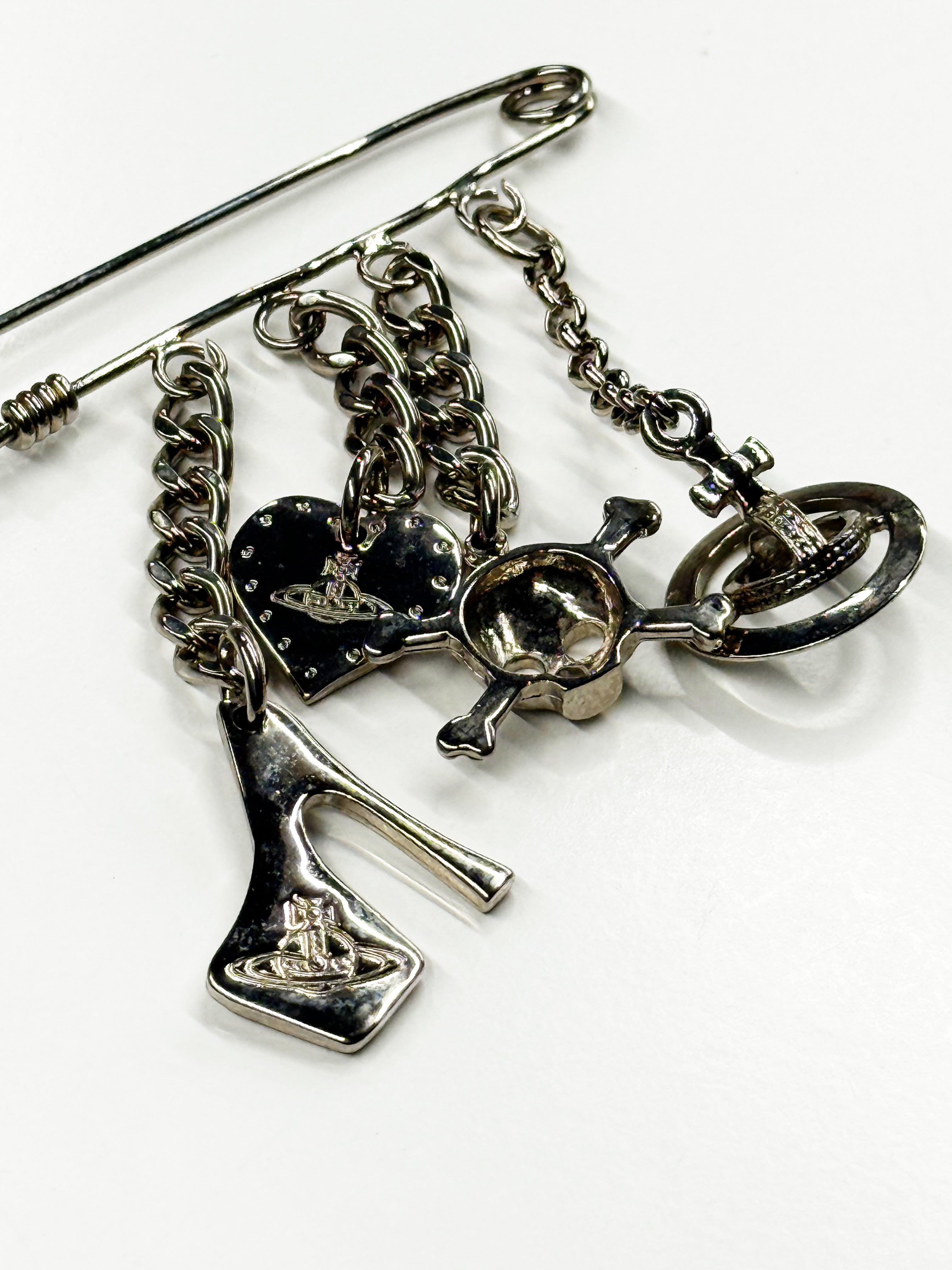 Vivienne Westwood Safety Pin Charm Brooch with Orb & Skull Motifs