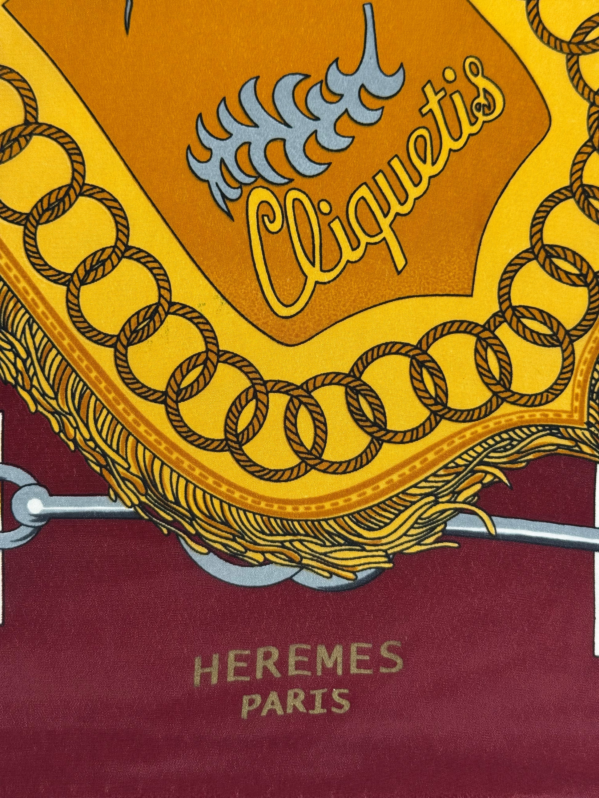 HERMÈS “CLIQUETIS” VINTAGE SILK SCARF – BORDEAUX